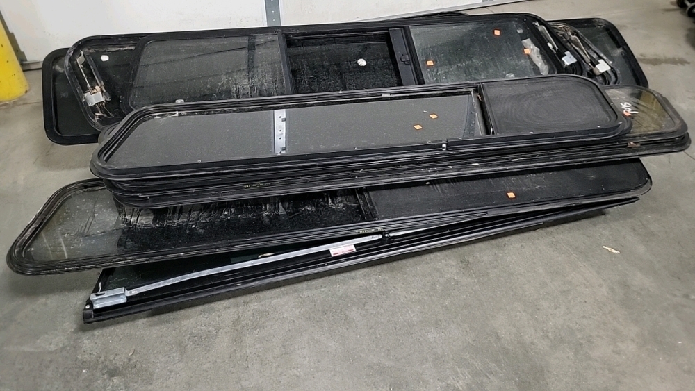 Pallet of Camper Shell Windows