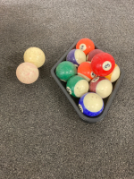 Pool balls and cues