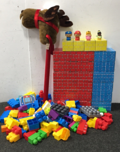 Blocks, kids leggos, and stick Reindeer.