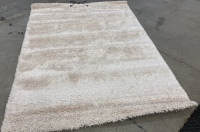 5’3” x 7’ Cream Shag Area Rug