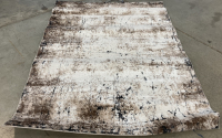 5’3” x 7’ White/Brown Area Rug