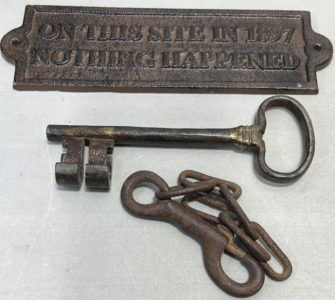 (1) On This Site In 1887 Nothing Happened Cast Iron Sign 8”x 2-3/4”, (1) Skeleton Key 6-1/2”