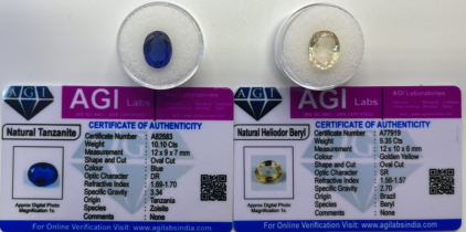 (1) 10.10ct Natural Tanzanite, (1) 9.35ct Natural Heliodor Beryl (Both W/ COA)