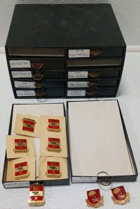 Box With (10) Drawers Full Of Breast Pins