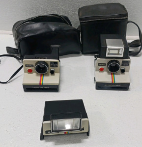 (2) Polaroid Cameras