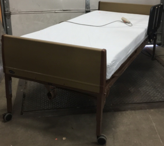 Invacare Motorized Hospital Bed With Rails and Mattress