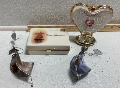 &ldquo;Granddaughter, Precious Jewel&rdquo; Figure, &ldquo;Dear Grandson&rdquo; Music Box, &ldquo;Guardian of the Heights&rdquo; and &ldquo;Fearless Spirit&rdquo; Ornaments
