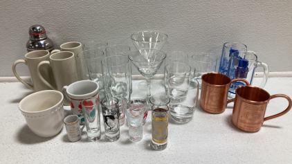 (3) Tall Mugs, (4) Drinking Glasses, (4) Short Drinking Glasses, (2) Glass Steins, (2) Copper Mule Mugs, (8) Shot Glasses, (2) Mismatched Mugs, Cocktail Shaker, (2) Mismatched Martini Glasses