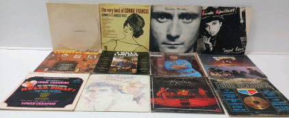 (12) Vinyl Records Including The Beatles And Phil Collins