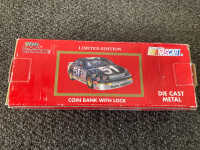Lot Of Personal Items Candle, NASCAR Coin Bank, New Book End, More