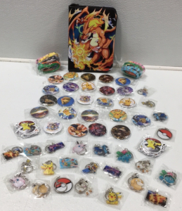 Pokémon Card Binder, (24) Pokémon Pins, (24) Pokémon Keychains, & More