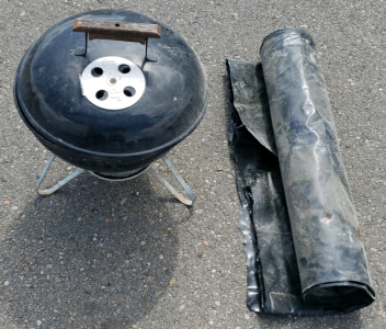 Weber Charcoal Grill And Roll Of Plastic