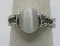 Opal Like Stone In Silver Toned Ring