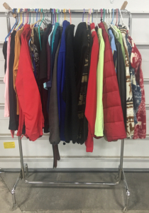 Clothing Rack With Lots Of Winter Clothing