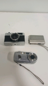 (1) Vintage Minolta Hi-Matic Camera (2) Sony Digital Cameras