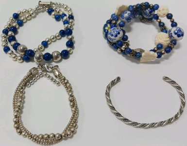 (4) Bracelets With Silver Tones