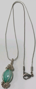 Silver Toned Necklace With Turquoise Coloed Stone