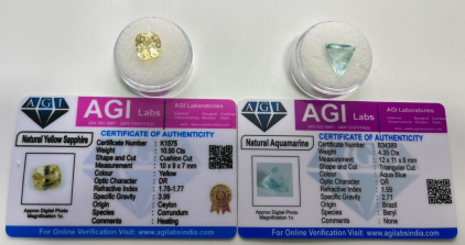 Certified Natural Gemstones (1) 10.50ct Natural Yellow Sapphire Cushion Cut, (1) 4.35ct Natural Aquamarine Triangular Cut. Both With C.O.A.