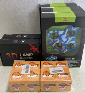 (3) RC Fighter Jets, (2) 3D Superhero Lamps, (2) Set of 4 Gudetama Squish Toys