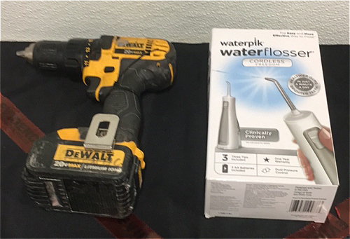 (1) DeWalt 20V Max Cordless 1/2” Drill Driver With Battery (1) Waterpik Water Flosser