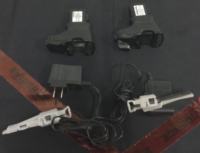 (2) Taser Brand Taser Camera/ Rechargeable Lithium Ion Batteries With (2) Chargers