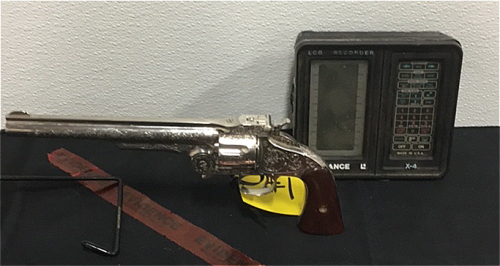 (1) Replica Engraved Western Large Caliber Revolver (1) Lowrance LCG Recorder