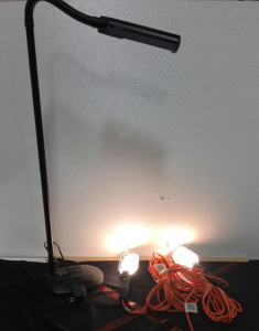 (1) Ott-Lite Floor Lamp (2) Commercial Electric 25’ Metal Utility Lights