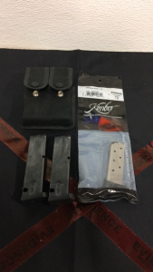 (2) Taurus 9MM Magazine’s (1) Uncle Mikes 2-Magazine Holster (1) Kimber Micro 7-Round 380 ACP Magazine