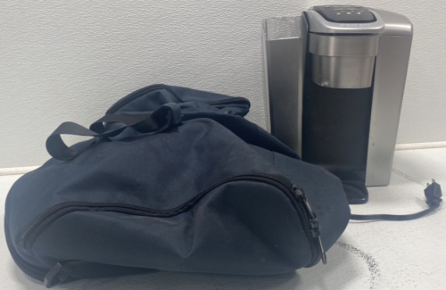 (1) Dark Blue Large Duffle Bag, (1) Keurig Coffee Maker