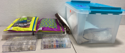 Medium Sized Clear Bin with Teal/Blue Lid Filled with Bracelet Making Supplies