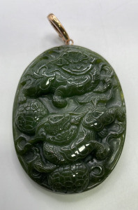 (1) Carved Jade Medalion W/ Bronze Toned Clasp