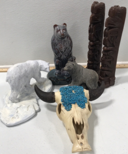 (1) Ceramic Skull (2) Totem Candles (1) Cement Bear (1) Ceramic Standing Bear (1) Polar Bear Figurine
