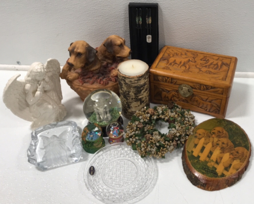 (2) Pairs of Wooden Opalescent Shell Chopsticks (2) Small Wreaths (1) Hand Carved Wooden Jewelry Box (1) Porcelain Praying Angel (1) Wooden Puppy Plaque (1) Glass Angel (2) Eeyore Snowglobes (1) Elephant Snowglobe (1) Small Crystal Plate (1) Puppies in A