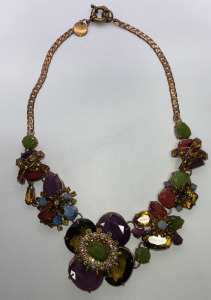 (1) IMAN Gemstone and Copper Toned Necklace.