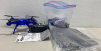 (1) Blue Remote Controlled Helicopter/Drone and (1) Samsung circuit Board