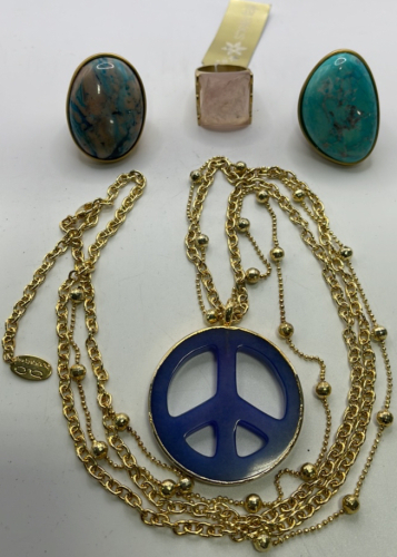 (1) Purple Peace Sign Gold Toned Necklace (2) Brass Toned Polished Gemstone Rings Size 7 & 10, (1) Sheila Fajl Rose Quarts Brass Toned Ring Size 8-1/2