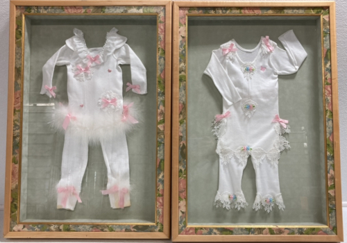 (2) Framed Vintage Baby Clothes