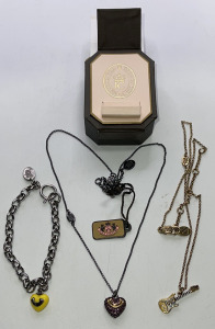 (1) Juicy Couture Purple Heart Necklace, (1) Juicy Couture Electric Guitar W/ Gold Toned Necklace, (1) Yellow Heart W/ Silver Toned Bracelet