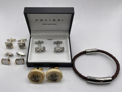 (1) Set Colibri Stainless Steel Diamond Men&rsquo;s Cufflinks, (1) Set Bone Cufflinks W/ Ship Art, (1) Silver Toned Men&rsquo;s Cufflinks, (1) Set Silver And Gold Toned Men&rsquo;s Cufflinks, (1) Magnetic Stainless Steel And Weaved Leather Men&rsquo;s Bracelet