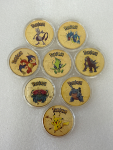 (8) Gold Toned Collectible Pok&eacute;mon Coins Please Inspect