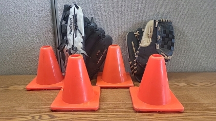 Baseball Gloves with Small Orange Cones