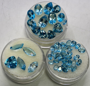 Tricut, Teardrop, Emerald, Oval, Football Cut And Faceted Blue Topaz Gemstones