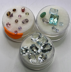 Various Faceted Gemstones… Aquamarine, Emeralds +