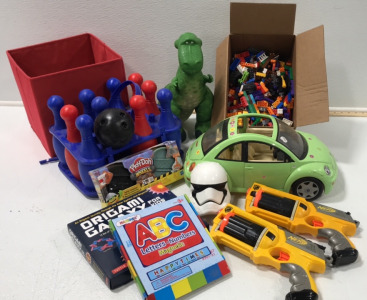 (1) Play-Doh Wheels (1) Star Wars Playing Cards (2) Nerf Guns (1) Plastic Bowling Set (1) Magnetic Letters and Numbers (1) Origami Galaxy (1) Toy VW Bug (1) Toy Dinosaur (1) Box of Assorted Legos (1) Fabric Storage Box