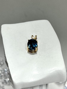 14k Yellow Gold Oval 2.53tcw Blue Topaz Pendant