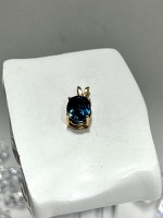 14k Yellow Gold Oval 2.53tcw Blue Topaz Pendant