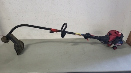 Troy Bilt 2-Cycle Weed Eater, Has Compression