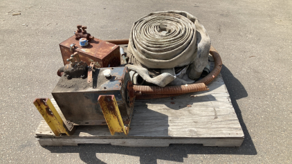 Pallet With Hydraulic Pumps And Large Irrigation Hoses