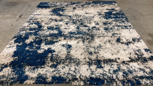 7’10” x 10’ Blue/Tan Shag Area Rug