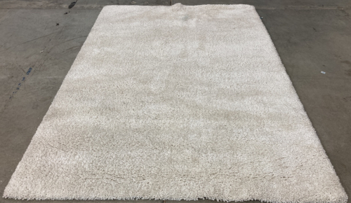 5’3” x 7’5” Cream Shag Area Rug